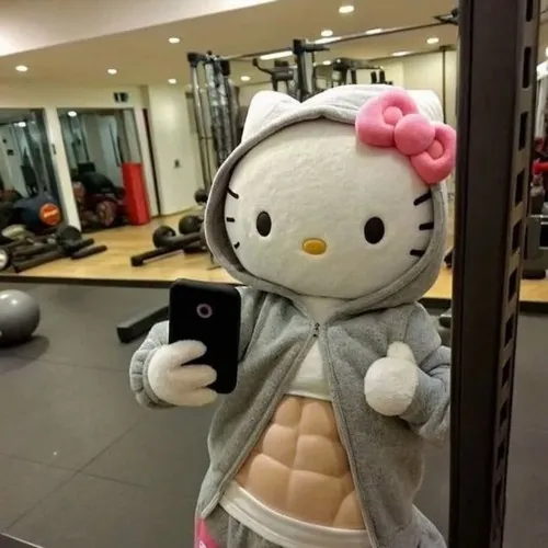 Hình troll Kitty đô con bắp tay nổi gân tạo sắc thái đối lập mềm cứng