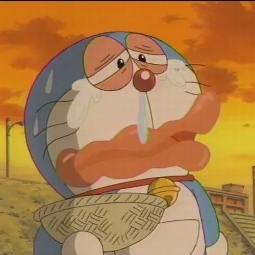 Meme Doraemon nhấn mạnh thân tròn mềm mại dễ thương.