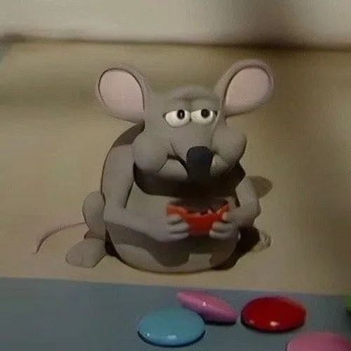 Meme chuột im lặng ngồi yên tạo vibe trầm mặc hiếm gặp.