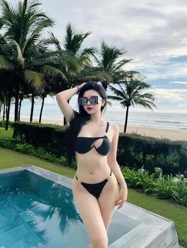 Bộ ảnh gái xinh Trung Quốc trong bikini hai mảnh, vóc dáng thon gọn cùng đường cong mềm mại mang lại cảm giác hấp dẫn nhưng vẫn tinh tế